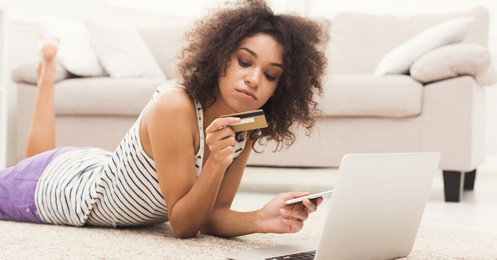 Young woman shopping online